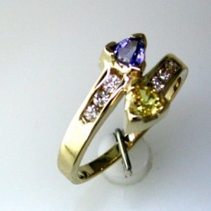 TANZANITE & YELLOW ‘SP’ RING