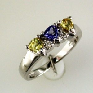 TANZANITE & YELLOW ‘SP’ RING