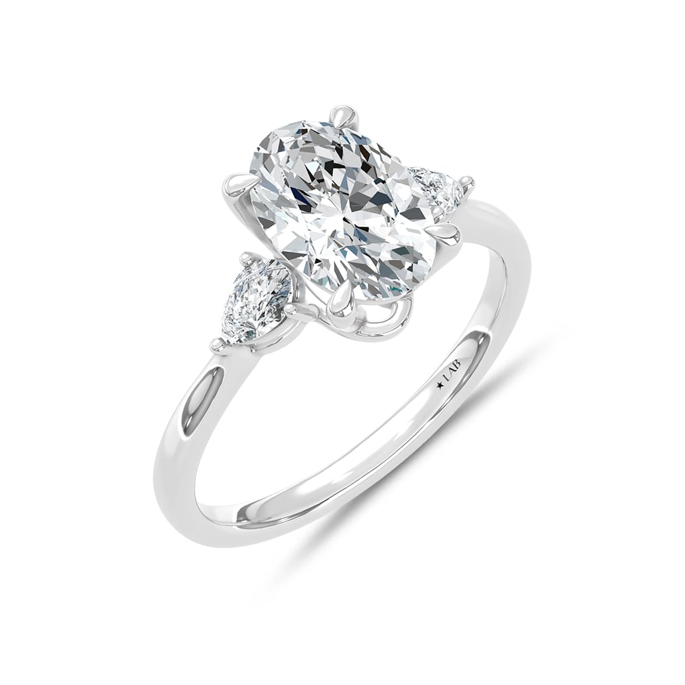 14K White Gold Lab Grown Diamond 2 1/4 Ct.Tw. Pear and Oval Three Stone Engagement Ring